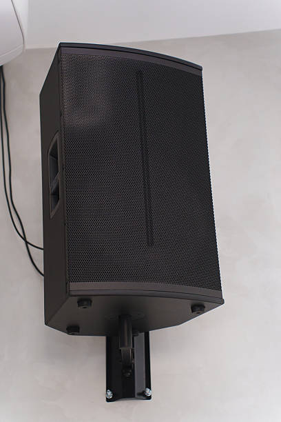 istock Wall-mounted speaker setup for effective sound distribution in a venue 2208098462