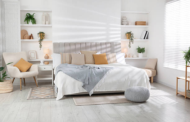 istock Comfortable large bed in beautiful room. Interior design 2208103073