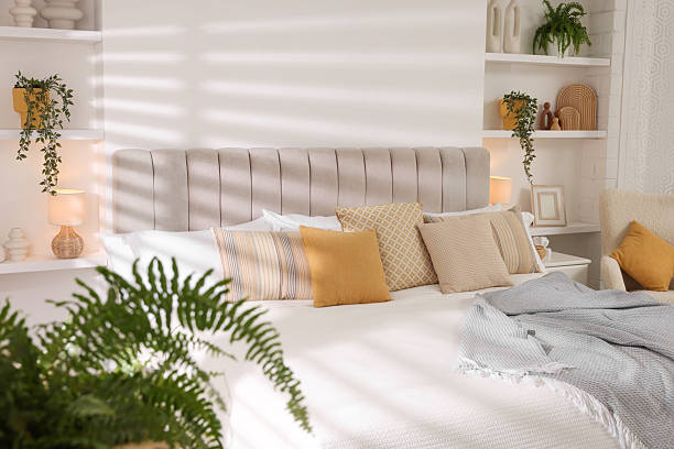 istock Comfortable large bed in beautiful room. Interior design 2208103075