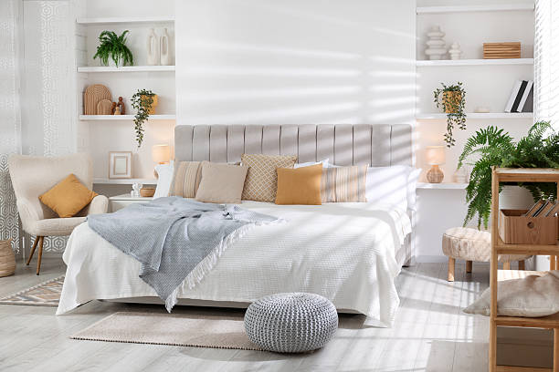 istock Comfortable large bed in beautiful room. Interior design 2208103077