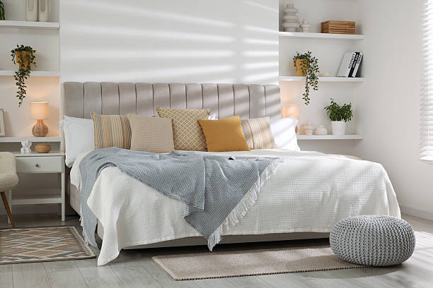 istock Comfortable large bed in beautiful room. Interior design 2208103078