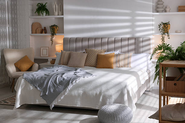 istock Comfortable large bed in beautiful room. Interior design 2208103106