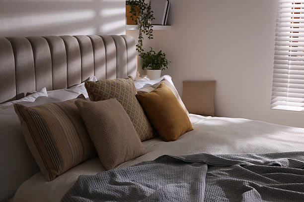 istock Comfortable large bed in beautiful room. Interior design 2208103109