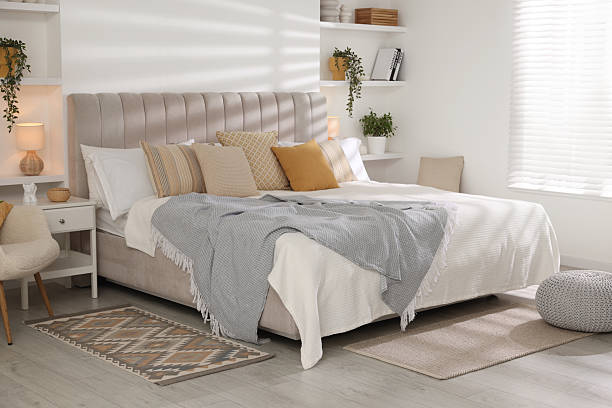 istock Comfortable large bed in beautiful room. Interior design 2208103161