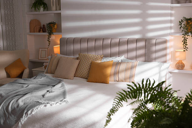 istock Comfortable large bed in beautiful room. Interior design 2208103164