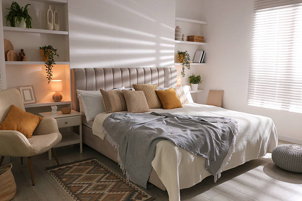istock Comfortable large bed in beautiful room. Interior design 2208103165