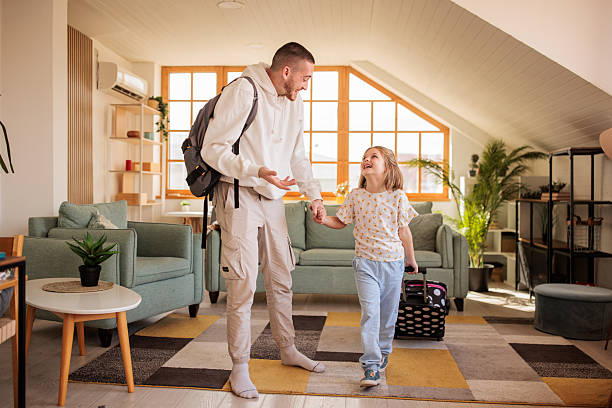 istock Young man and his niece preparing for a trip together 2208103249