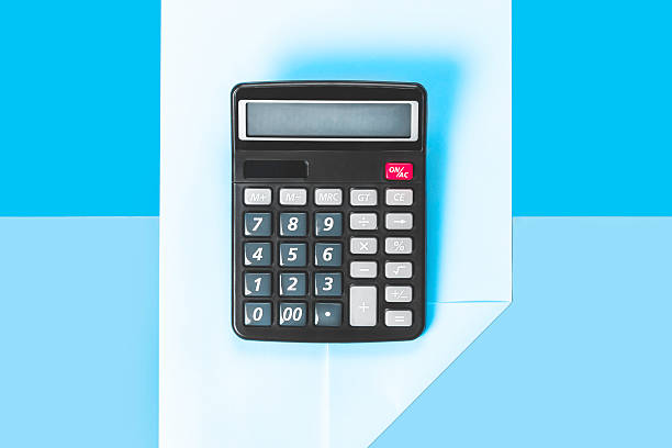 istock Electronic calculator on folded sheet of paper. 2208104341