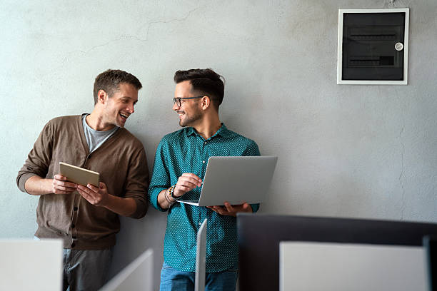 istock Social media, online, connect, technology concept. Startup. Happy business men working together 2208105607