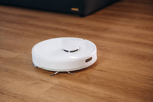 istock Wireless robotic vacuum cleaner is in the domestic room 2208107619