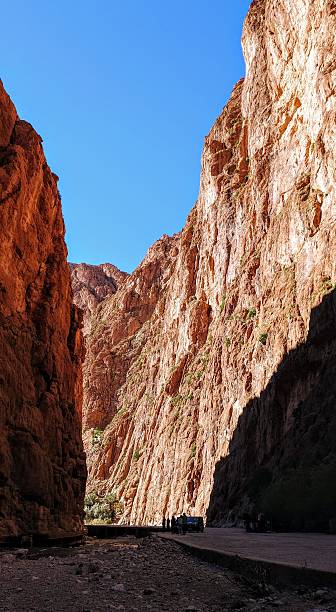 istock Scenic mountain gorge with steep rocky cliffs under a clear blue sky in Todra Gorge, Morocco 2208109570