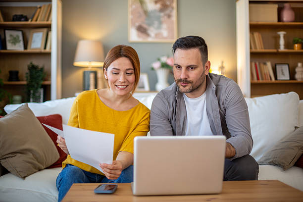 istock Couple discussing home finances 2208112453