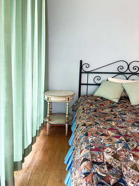 istock Vintage style bedroom lit by afternoon sunlight 2208119181