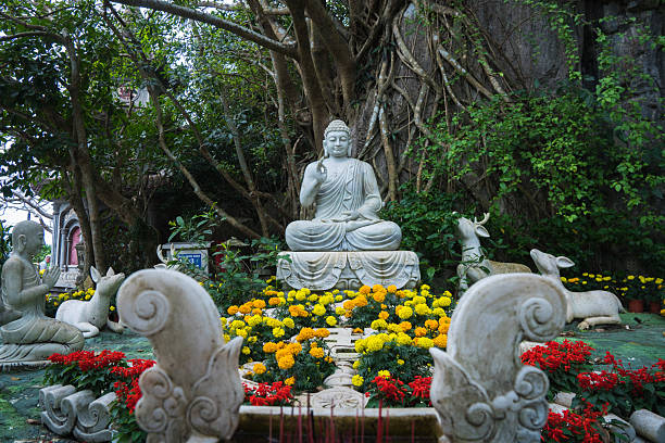 istock A Serene Buddha Statue Enveloped by Lush, Peaceful Nature and Tranquil Environment Marble Mountains, Vietnam 2208120504