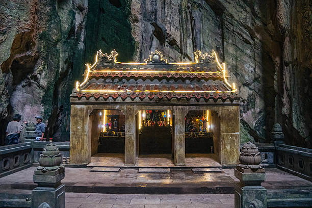 istock A Serene Buddha Statue Enveloped by Lush, Peaceful Nature and Tranquil Environment Marble Mountains, Vietnam 2208123326