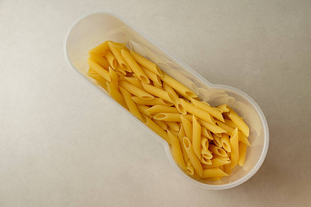 istock Unique pasta display in a clear container creates an artistic kitchen moment 2208131650