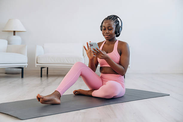 istock Break time. Woman is doing yoga at home 2208132481