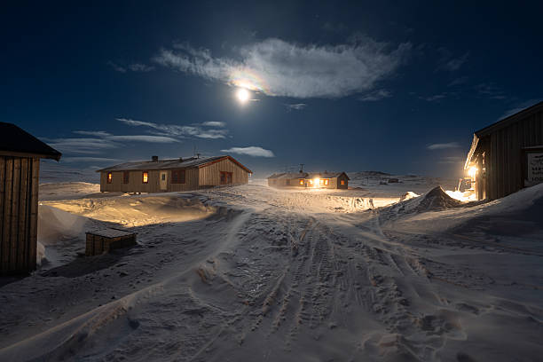 Full moon over Helags Mountain station in Jämtland, Sweden, during a cold and windy night in March.