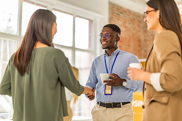 istock Engaging discussions at a business conference in a convention center with diverse participants networking and learning 2208141514