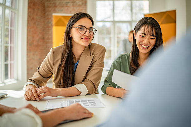 istock Engaging discussions highlight collaboration at business conference in convention center 2208144187