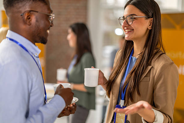 istock Networking and collaboration at a business conference in a convention center 2208144909