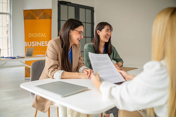 istock Networking and collaboration at a digital business conference in a modern convention center with engaged participants 2208146134
