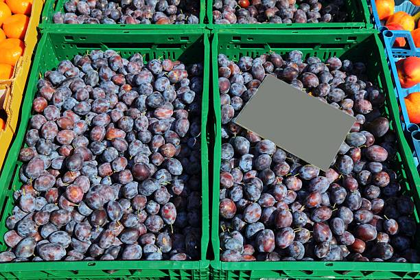 Damson plums at a food market in Dortmund, Germany.