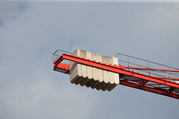 istock A striking red and white crane adorned with a toothbrush on top of it 2208148442