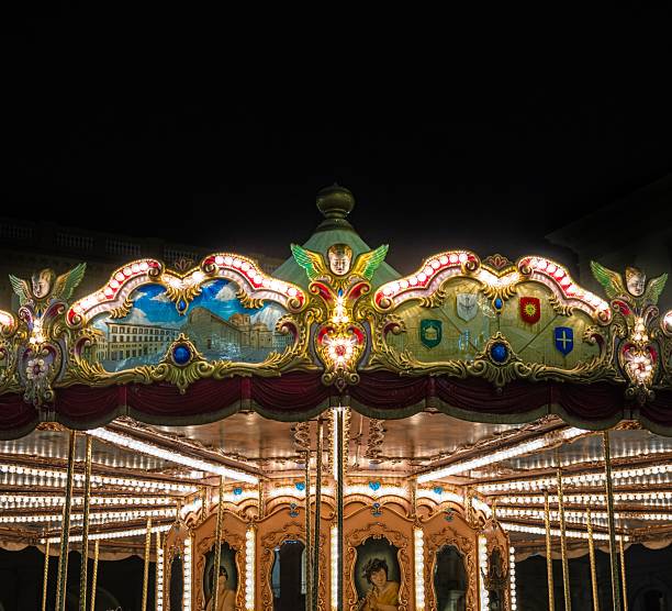 istock Vintage carousel top illuminated at night. 2208148583