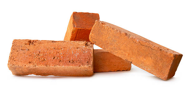 istock Side view of four cracked old red or orange bricks in stack isolated on white background with clipping path 2208151449