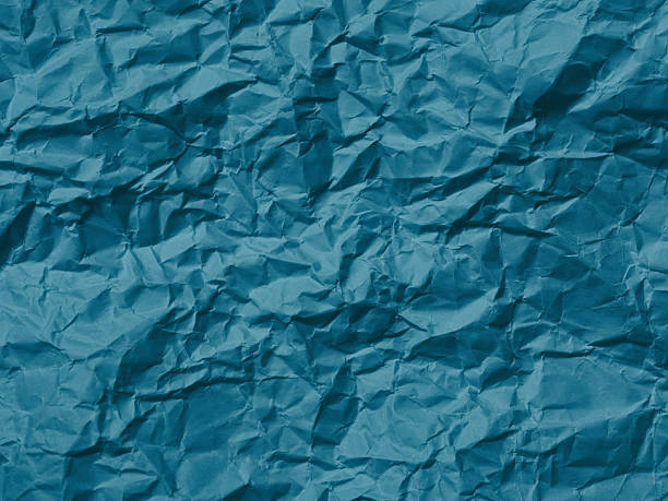 istock An indigo texture background. Crumpled paper 2208154113