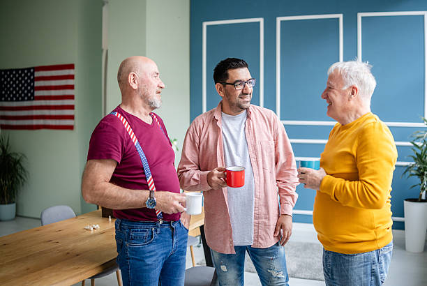 istock Military veterans enjoying conversations and laughter in a cozy indoor setting 2208154627