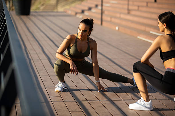 istock Friends doing warm up for the jogging 2208155140