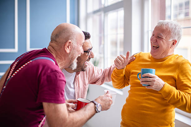 istock Veterans enjoying a lively conversation and laughter in a cozy indoor setting at home 2208155482