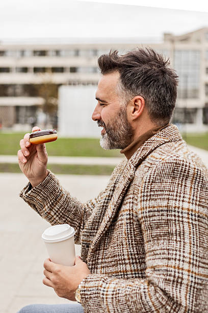 istock Young Professional Taking a Coffee Break in the City 2208159033