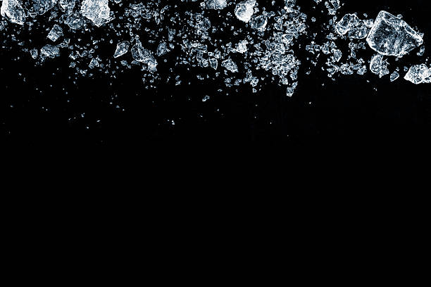 istock Crushed ice on black background. Crushing of the ice. 2208159102