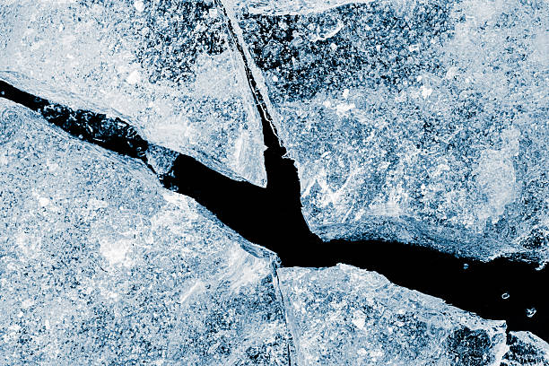 istock Crushed ice background texture in a cold tone. Cracked ice surface. 2208159735