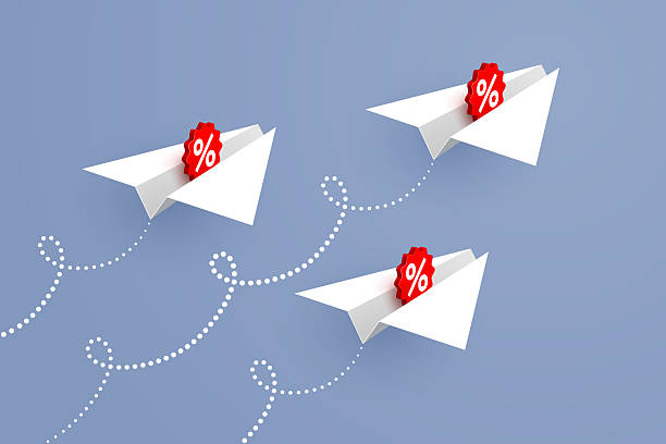 istock White paper airplanes with percent signs are flying upward 2208164484