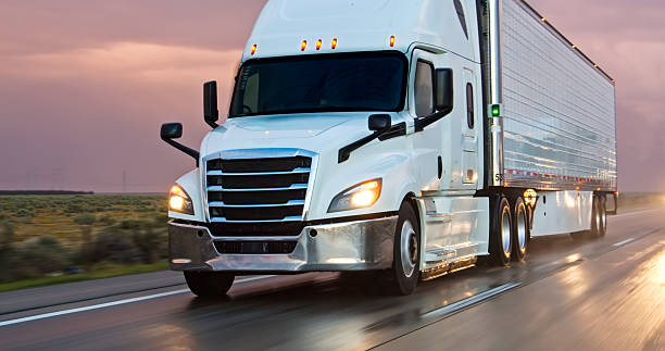 istock Cargo Truck Driving Interstate 5 in Stormy Weather 2208170597