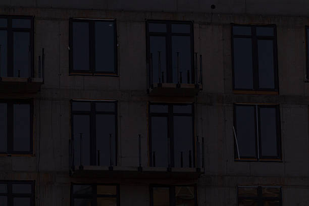 istock A building that features numerous windows is beautifully lit up at night 2208171260