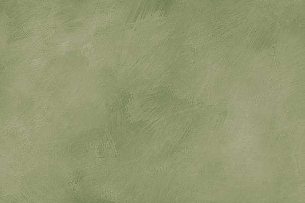 istock Concrete, plaster wall texture with brush strokes, messy shabby khaki surface background 2208173941