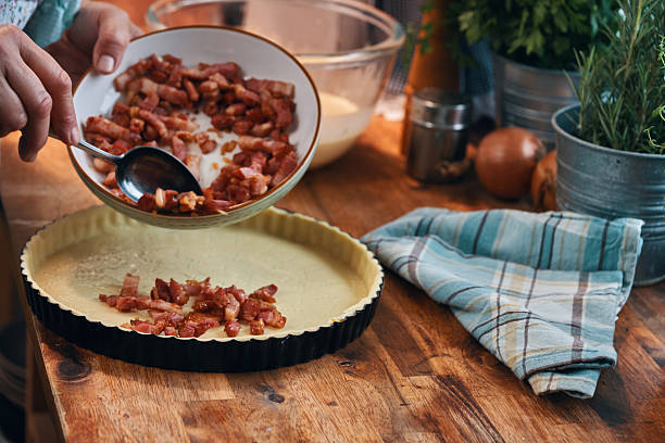 Preparing French Quiche Lorraine with Bacon