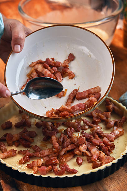 istock Preparing French Quiche Lorraine with Bacon 2208174583