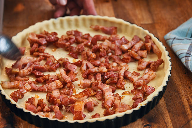 istock Preparing French Quiche Lorraine with Bacon 2208174608