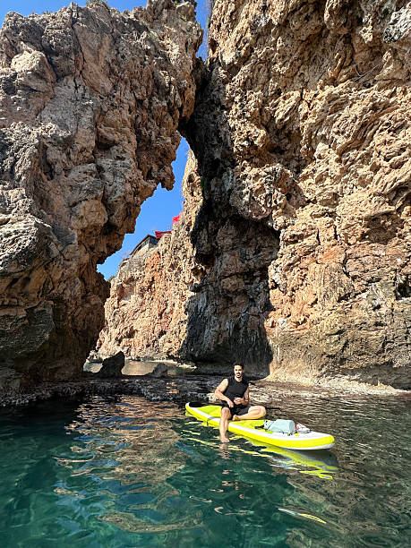 istock Tourist exploring antalya coastline on a stand-up paddleboard 2208177768