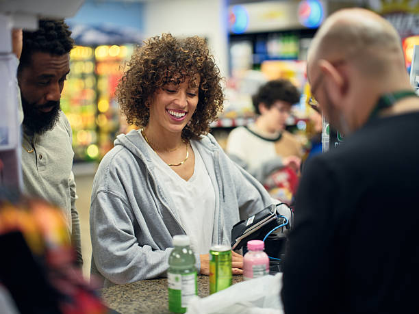 istock Young Couple Shopping in a Convenience Store 2208179250