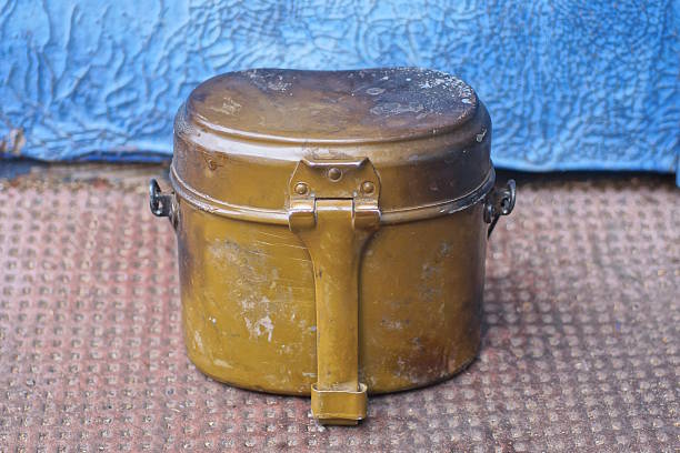 Different color and sizes of lunch boxes on white isolated background