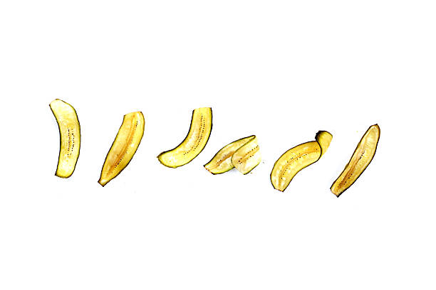istock Banana chips, fried slices banana with green peel 2208193979