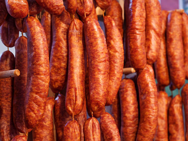 A beautifully crafted basket overflowing with traditional meats showcasing exceptional artisanal craftsmanship
