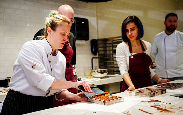 istock Cooking Workshop with Chef – Group Learning and Chocolate Decoration in Professional Kitchen 2208197346
